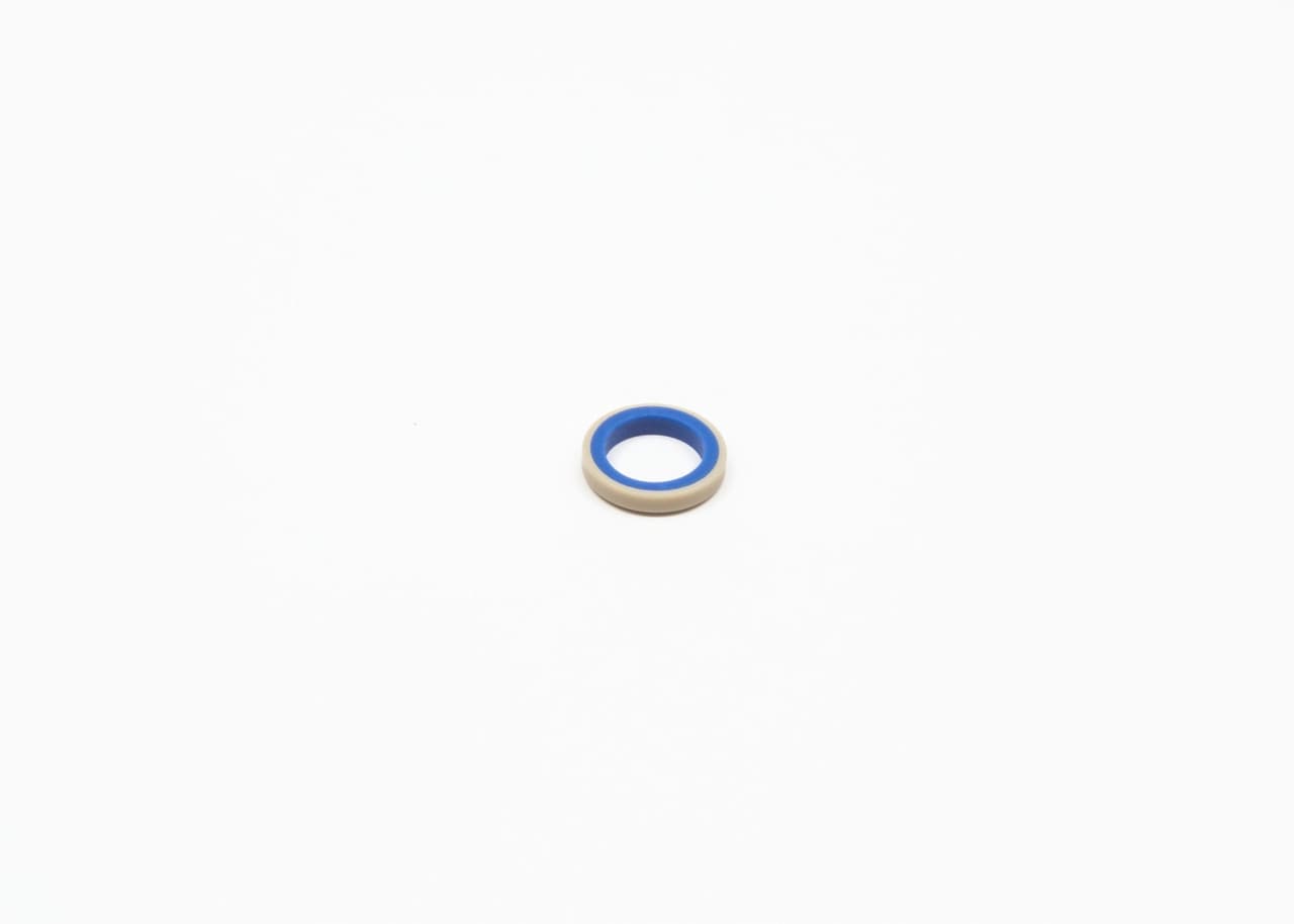 Joint, enjoliveur du projecteur principal
